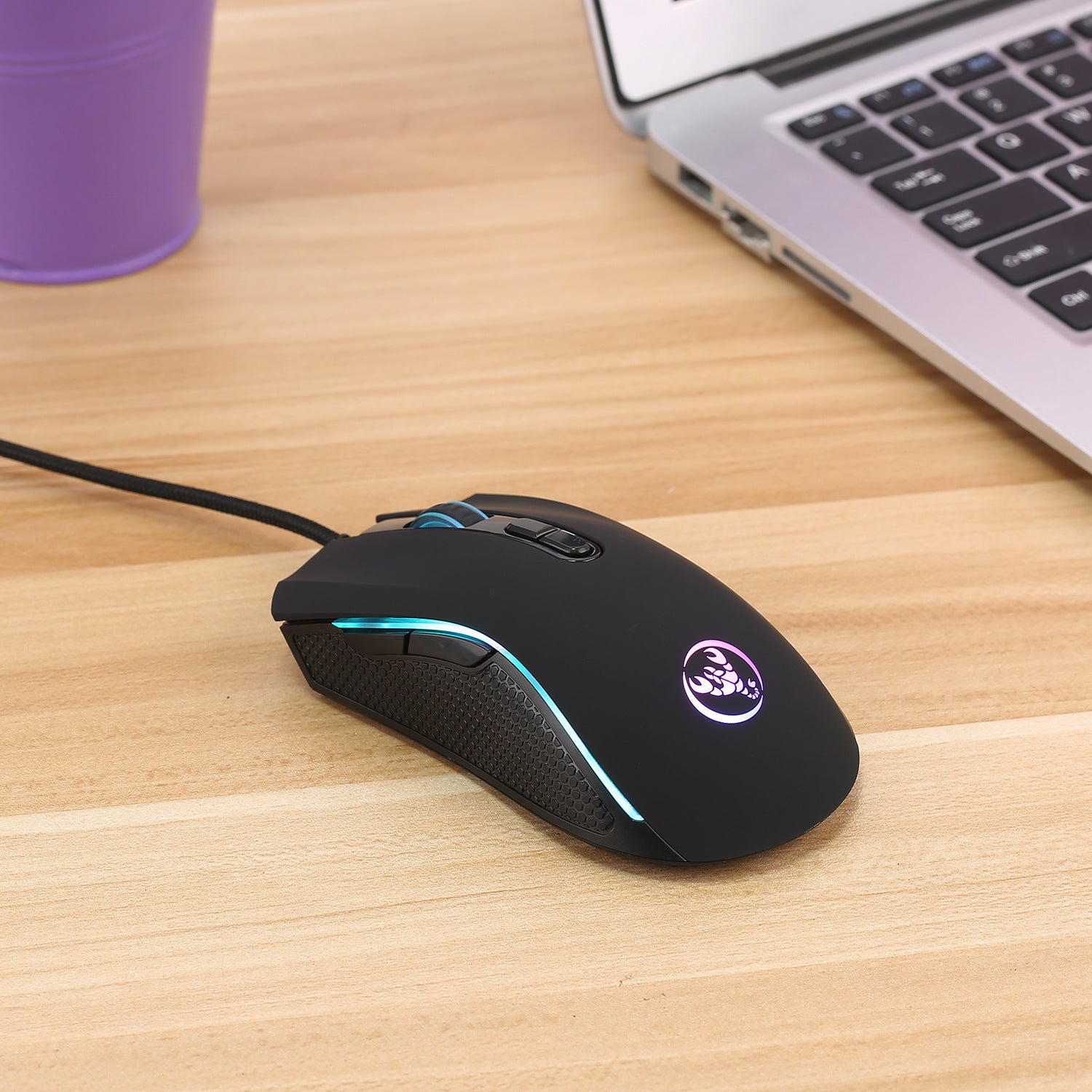 Gaming mouse and RGB keyboard on a modern PC gaming setup