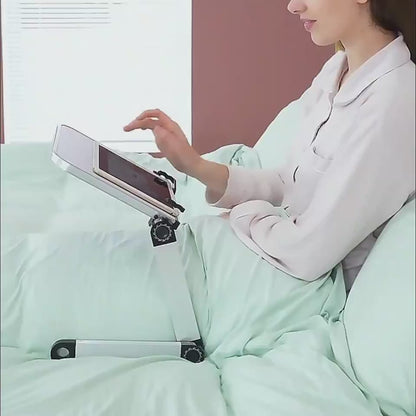 Adjustable foldable laptop stand demonstrating height and angle adjustment for comfortable desk use.