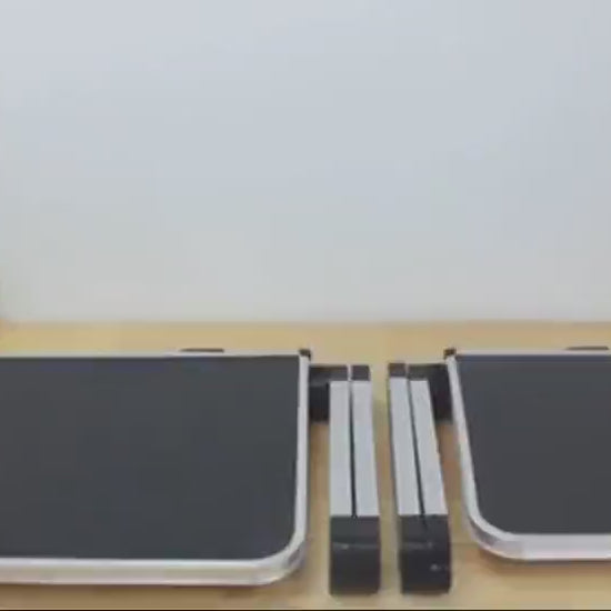 Portable foldable laptop stand demonstrating easy folding, storage, and use at home or while traveling.