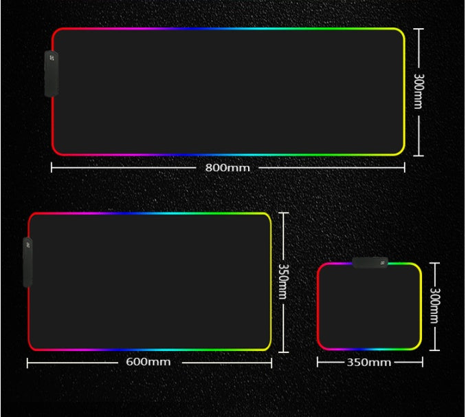 RGB LED gaming mouse pad with customizable colors for a stylish and organized computer desk setup.